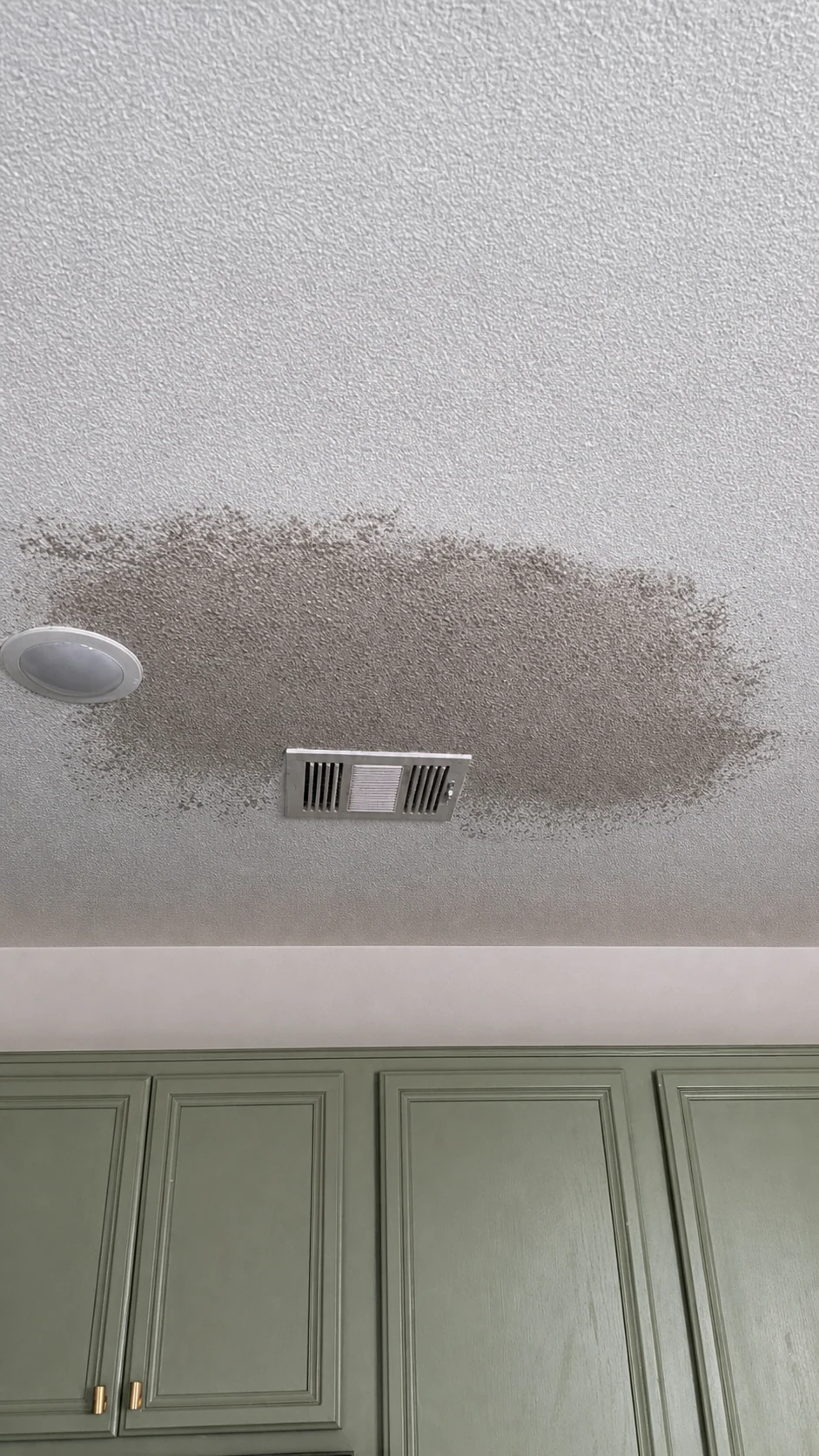 Professionally restored Moyeda field photo of ceiling texture matching around an HVAC vent