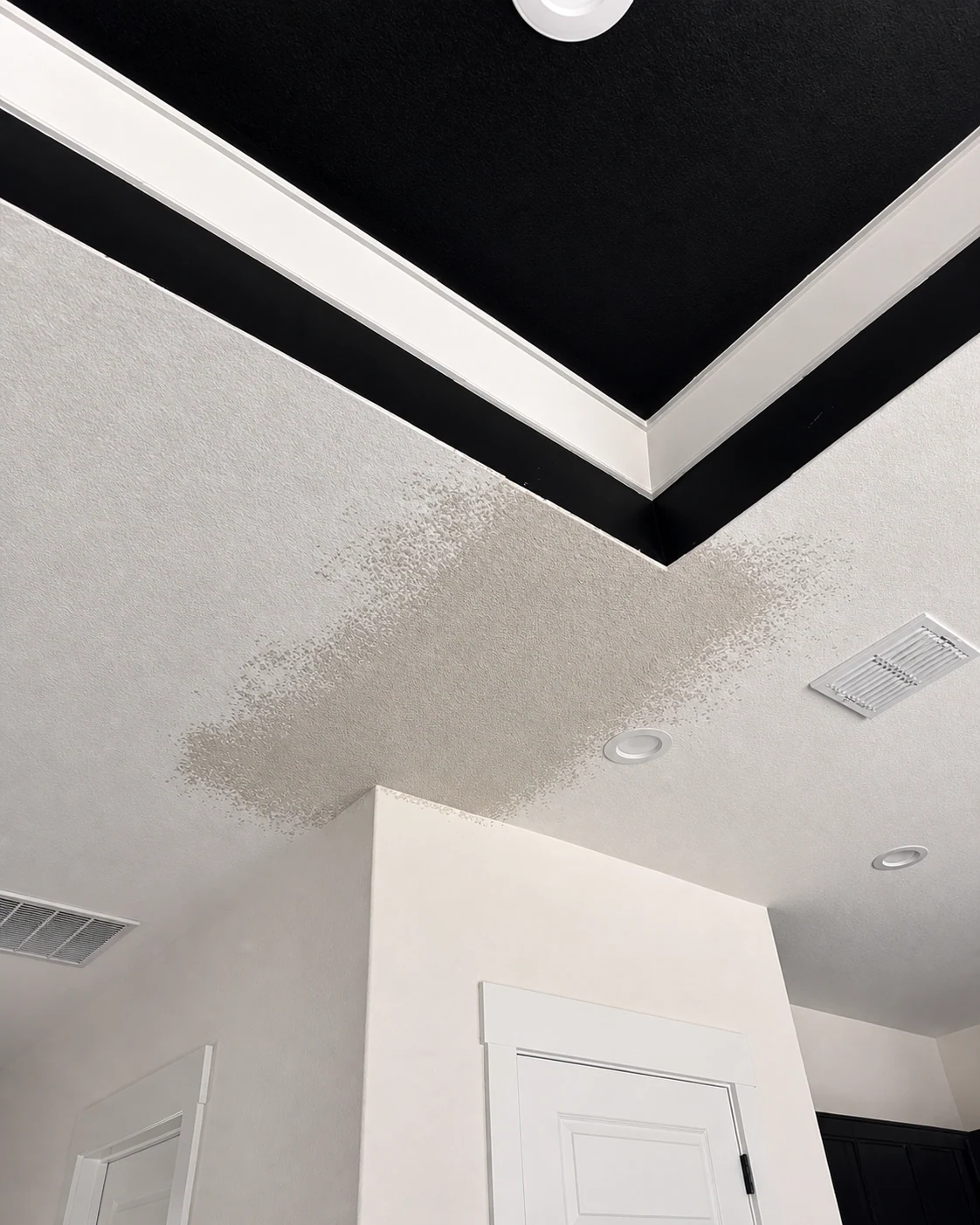 Professionally restored Moyeda field photo of a tray-ceiling repair after texture application