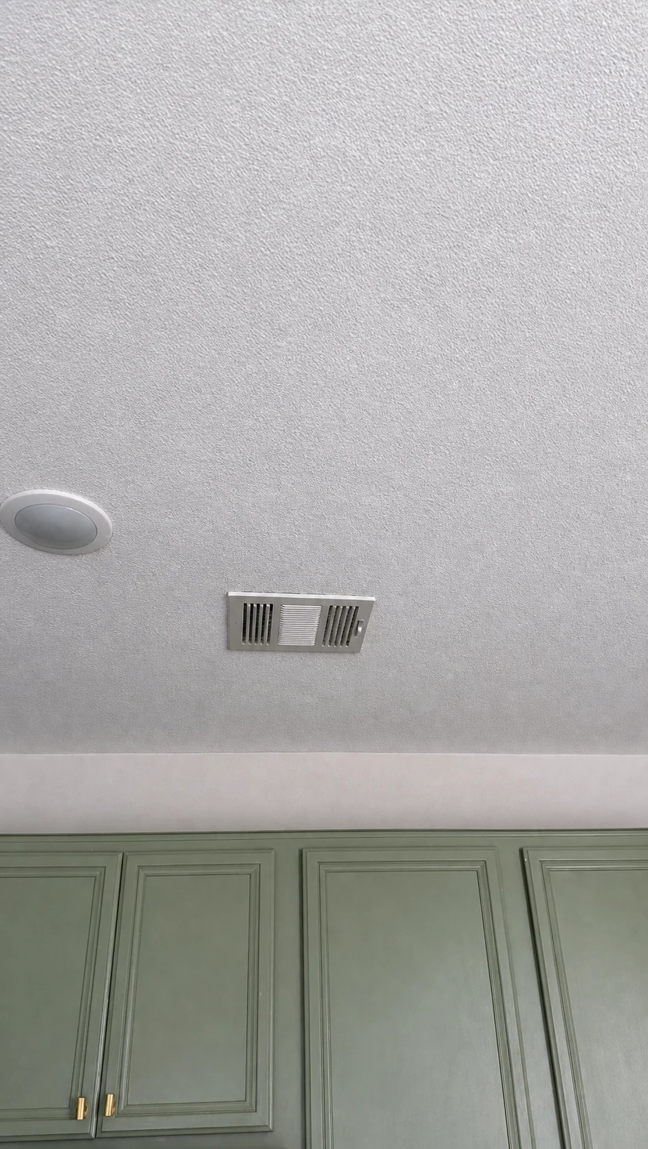 Finished ceiling repair study with matched texture around the HVAC vent